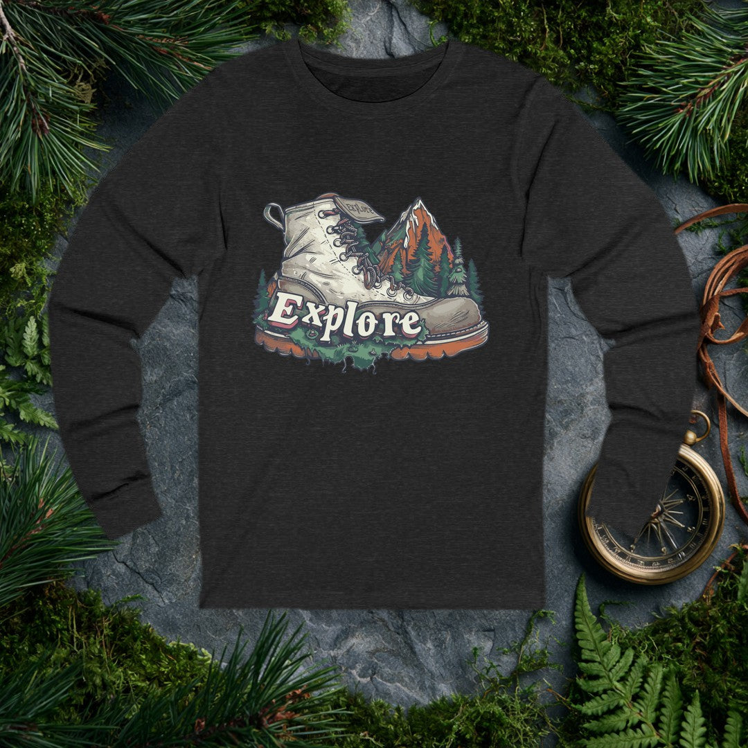 A worn leather hiking boot sits rooted among pine trees with a snow-capped red-rock peak rising behind it — the word Explore anchored across the front like a…