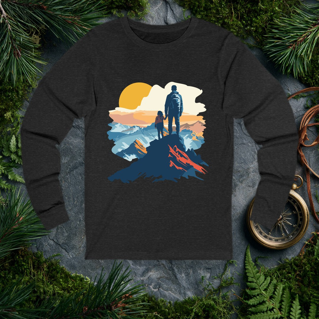 A parent and child stand on a rocky peak, backpacks on, hands locked, watching a wide golden sun rise over layered mountain ranges — built for the dad who…