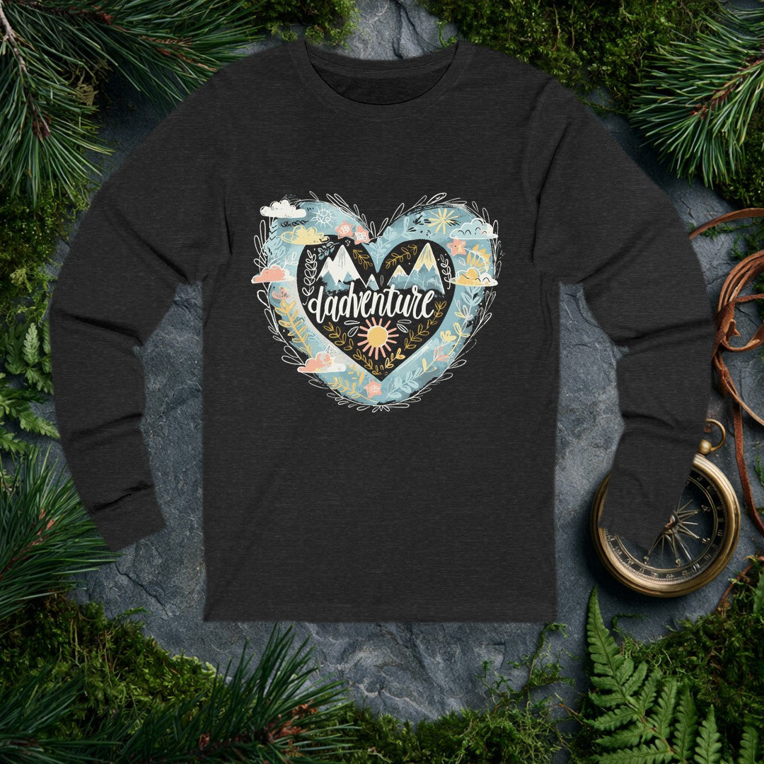 Snow-capped peaks rise inside a layered heart ringed with golden botanicals, a painted sun, and soft watercolor skies — the kind of scene a dad who'd rather be…