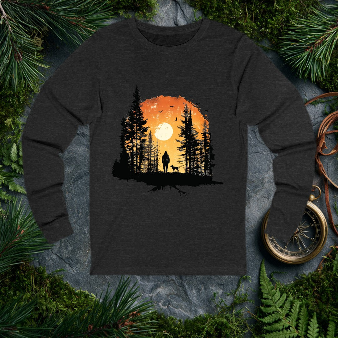 A lone hiker and his dog stand among tall pines as a full sun rises behind them, birds lifting into an amber sky — for the person whose best days start on a…