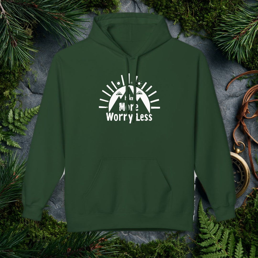 A bold rising sun crowns a lone hiker on the trail, rays fanning wide and the words Hike More, Worry Less anchored below — for the person who knows the cure…