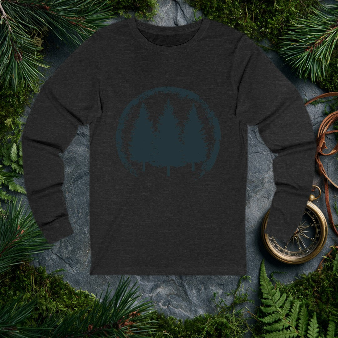 Three tall pines rise together inside a weathered circle, their silhouettes worn at the edges like a stamp pulled from an old trail map — for the person who's…