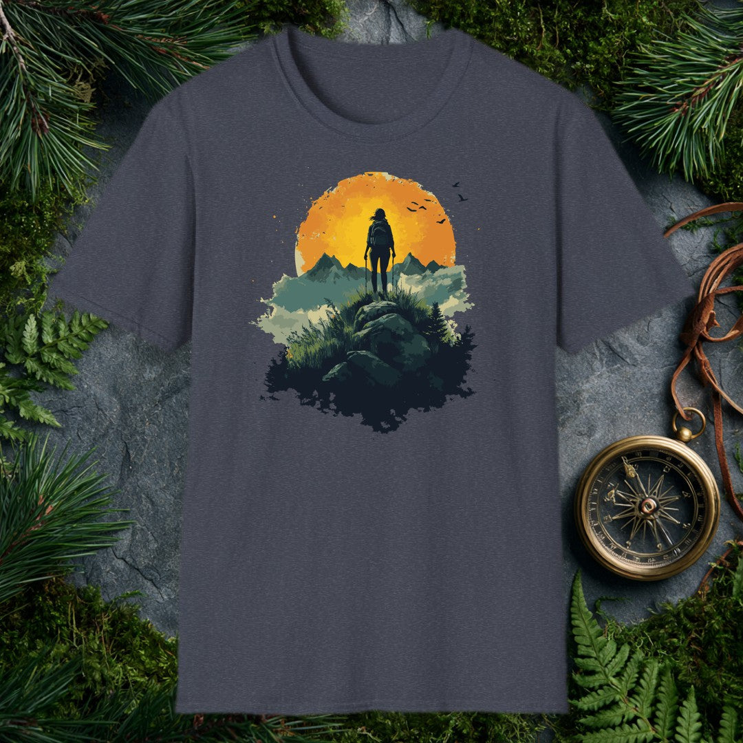 woman hiker silhouette with trekking poles atop a rocky ridge, large amber sun and mountain peaks behind her, birds in f