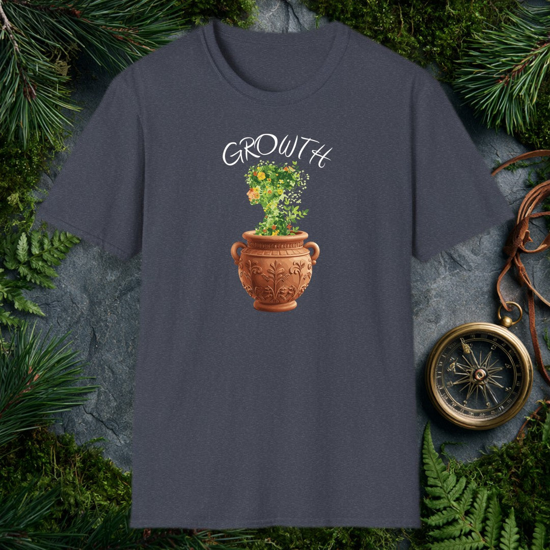 A woman's silhouette grows upward from an ornate terra cotta urn, her form made entirely of green vines, marigolds, and orange-red blooms — made for the…