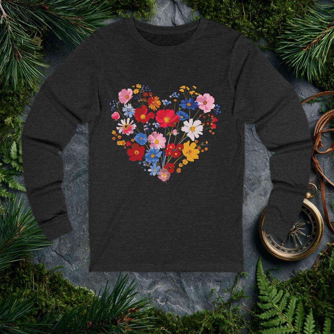 A generous heart built from cosmos, poppies, and wildflowers in red, blue, blush, and gold — the kind of bouquet someone who loves their garden gives to…