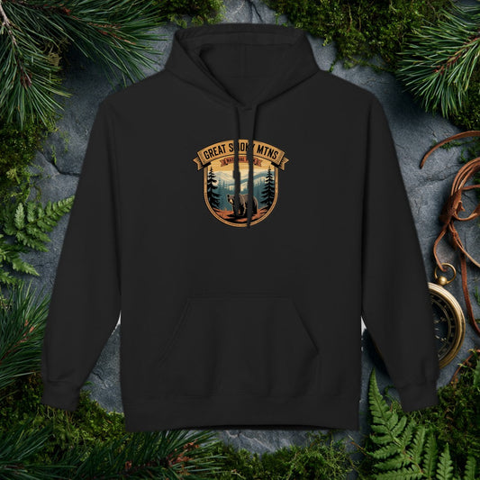 Cozy Meets the Outdoors A midweight softstyle fleece hoodie that's warm without the bulk — perfect for crisp trailheads, campfire nights, and everywhere in…