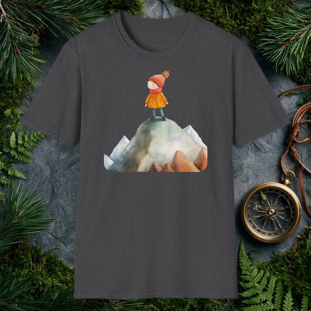 A small, determined figure in a mustard coat and red knit hat stands atop a snow-dusted mountain peak, surrounded by a range of smaller summits — painted in…