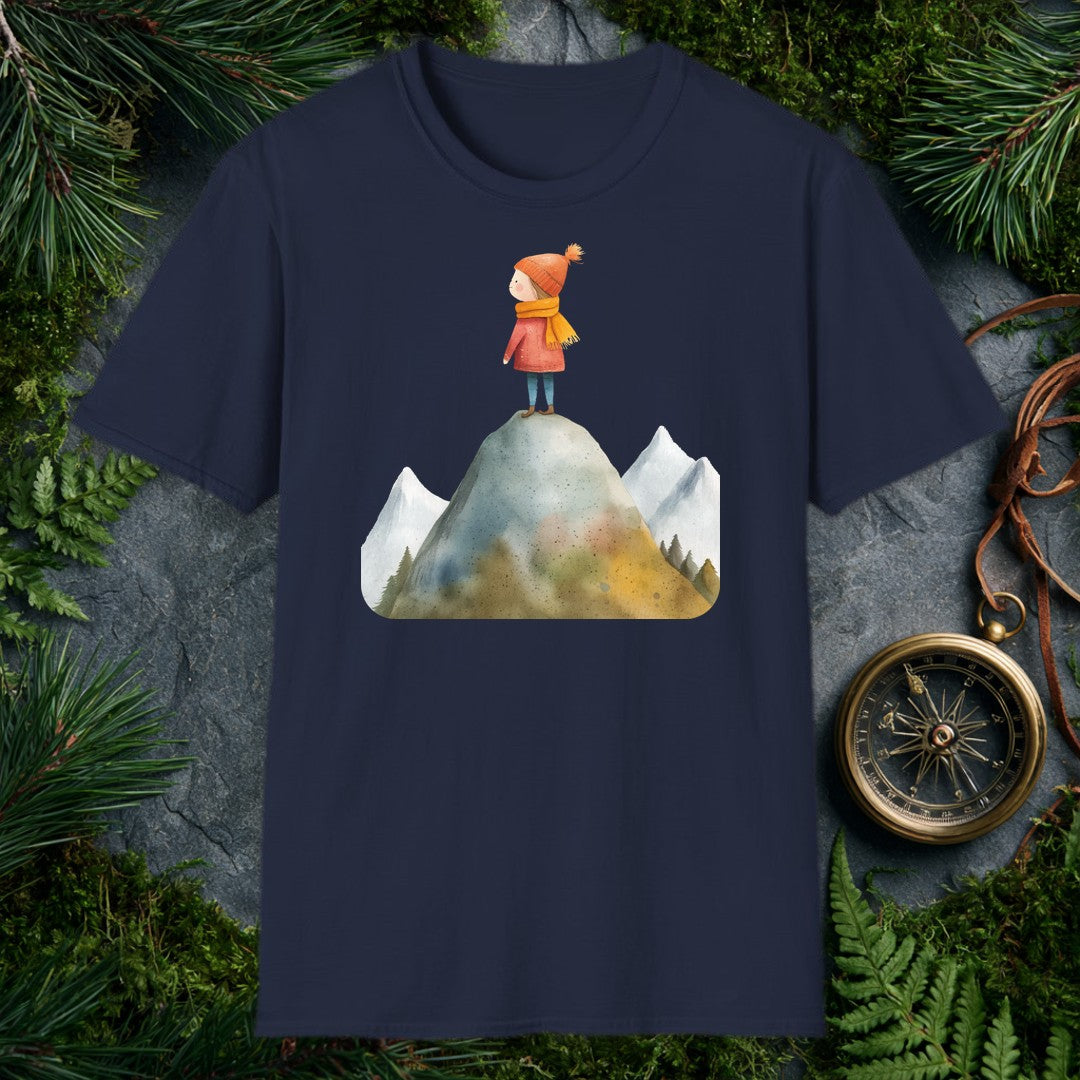 A small figure in a red coat and orange knit hat stands at the top of a rocky peak, pine-rimmed mountains fading blue behind her — for the hiker who knows that…