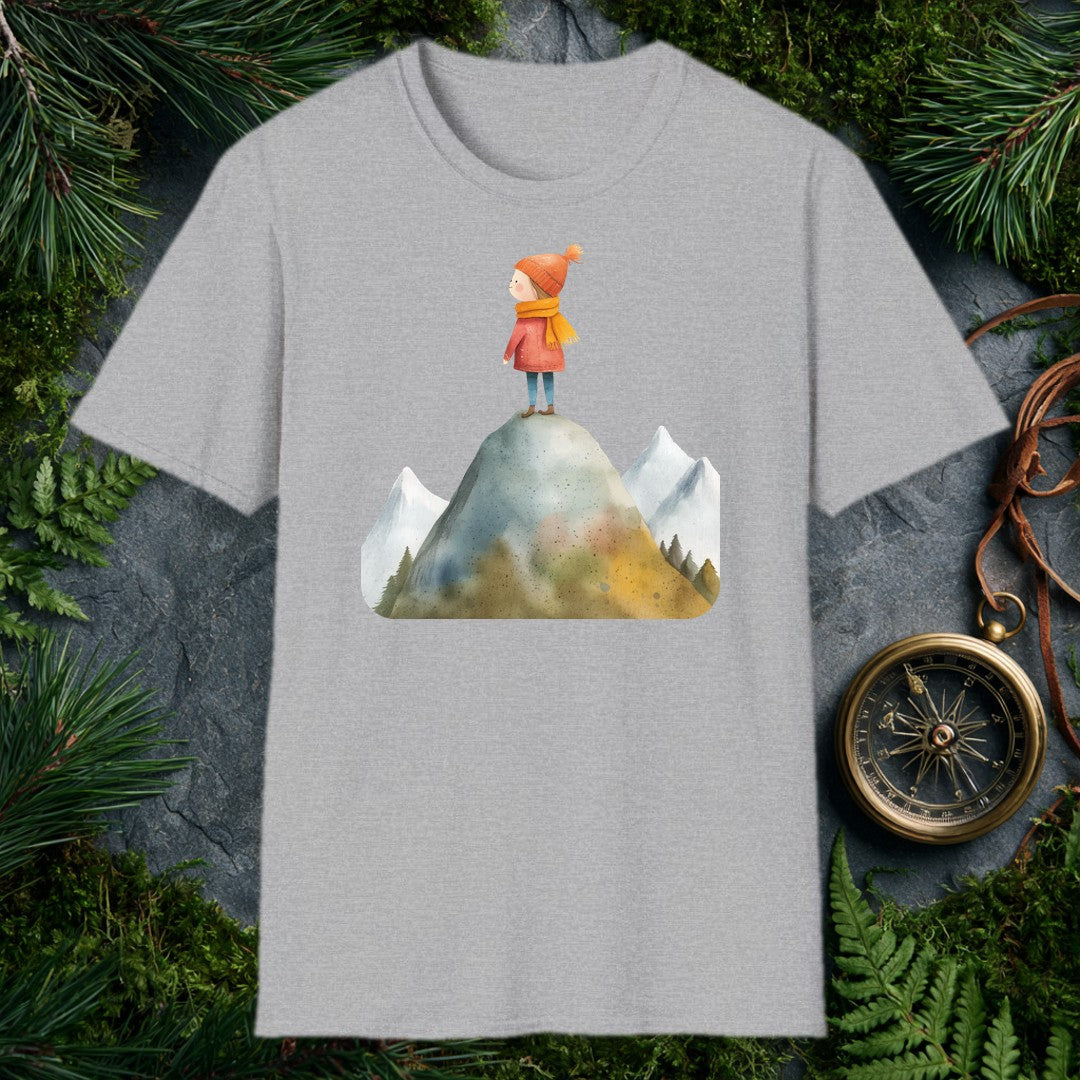 A small figure in a red coat and orange knit hat stands at the top of a rocky peak, pine-rimmed mountains fading blue behind her — for the hiker who knows that…