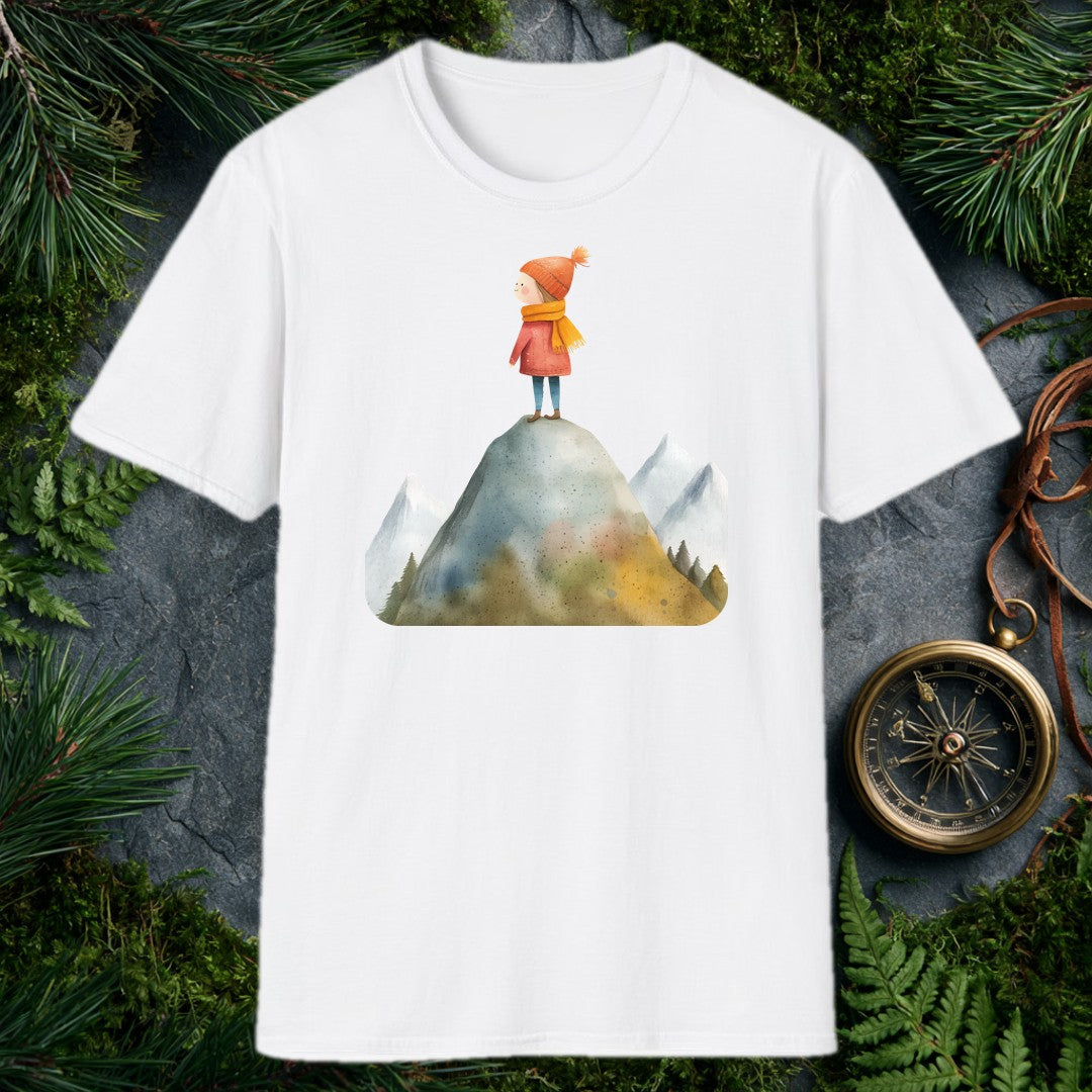 A small figure in a red coat and orange knit hat stands at the top of a rocky peak, pine-rimmed mountains fading blue behind her — for the hiker who knows that…