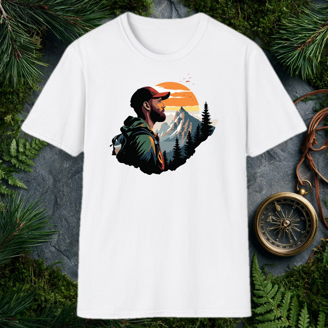 A bearded hiker with a loaded pack pauses to take in a snow-capped peak rising above a pine forest under a wide orange sunrise — for the person who knows…