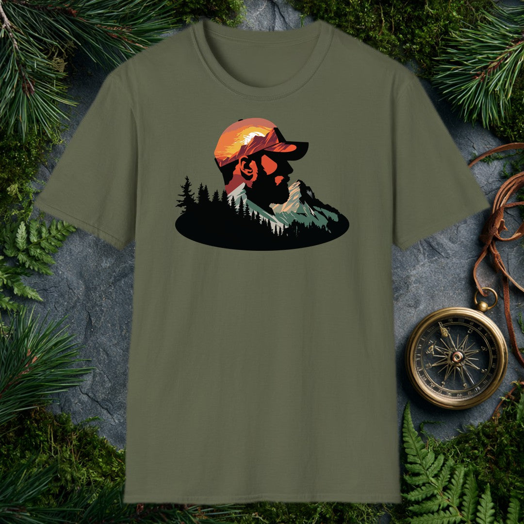 A bearded man in a ball cap becomes the landscape itself — mountains rise through his profile, pines crowd the ridge below, and a warm sunset burns behind the…