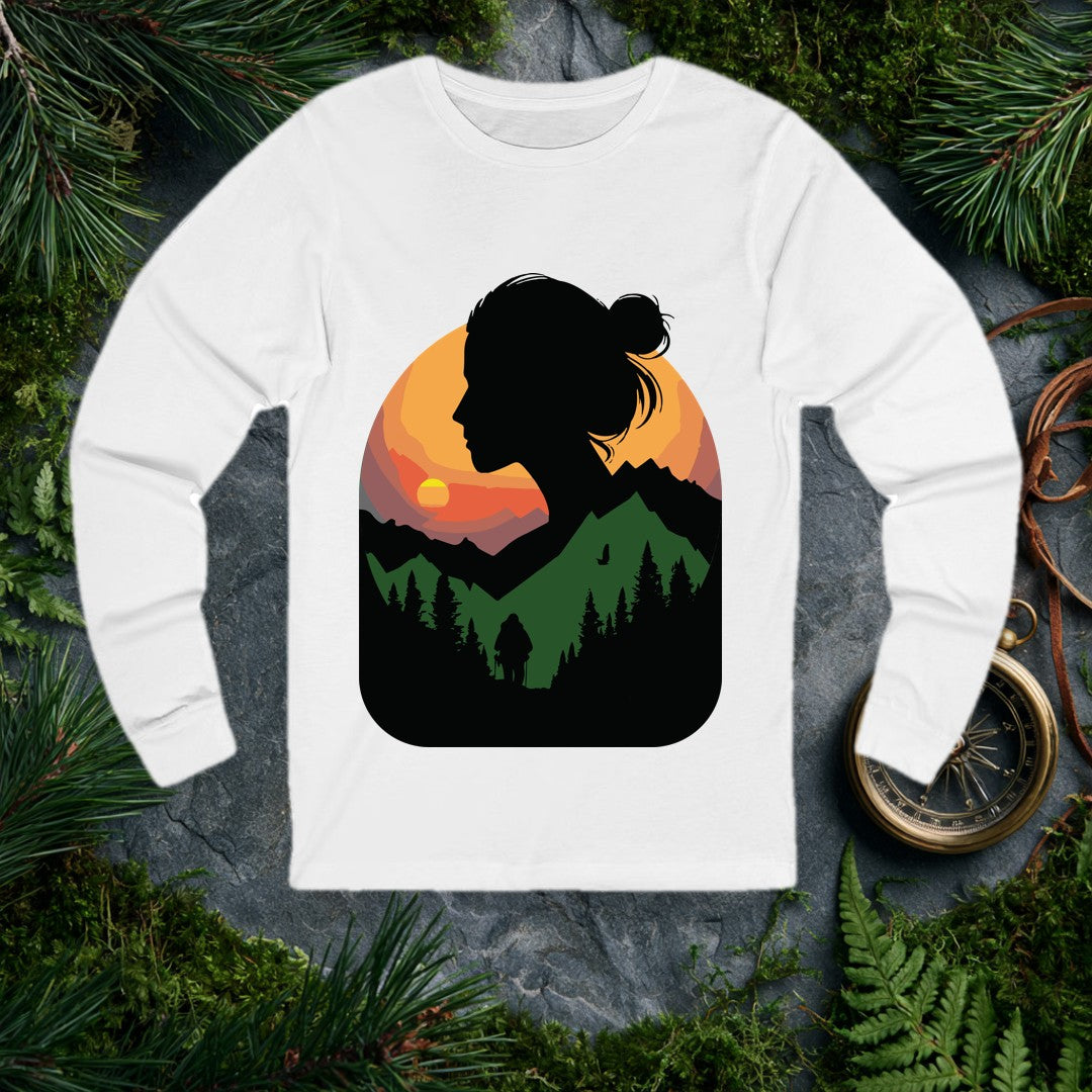 A woman's silhouette frames a layered mountain sunset — pine forest below, a lone backpacker on the trail, a bird crossing the orange sky above the ridgeline.…