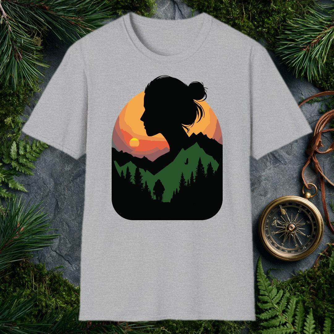 A woman's silhouette frames a layered mountain sunset — pine forest below, a lone backpacker on the trail, a bird crossing the orange sky above the ridgeline.…