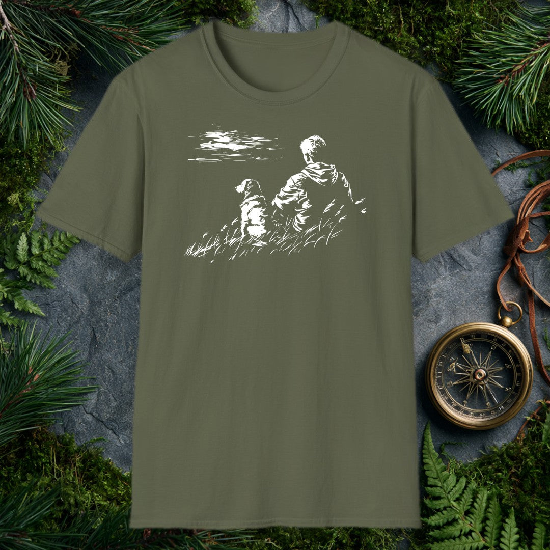 A kid and his dog sit side by side in tall grass, both watching something out across the water — the quiet kind of afternoon you don't forget. For anyone who…