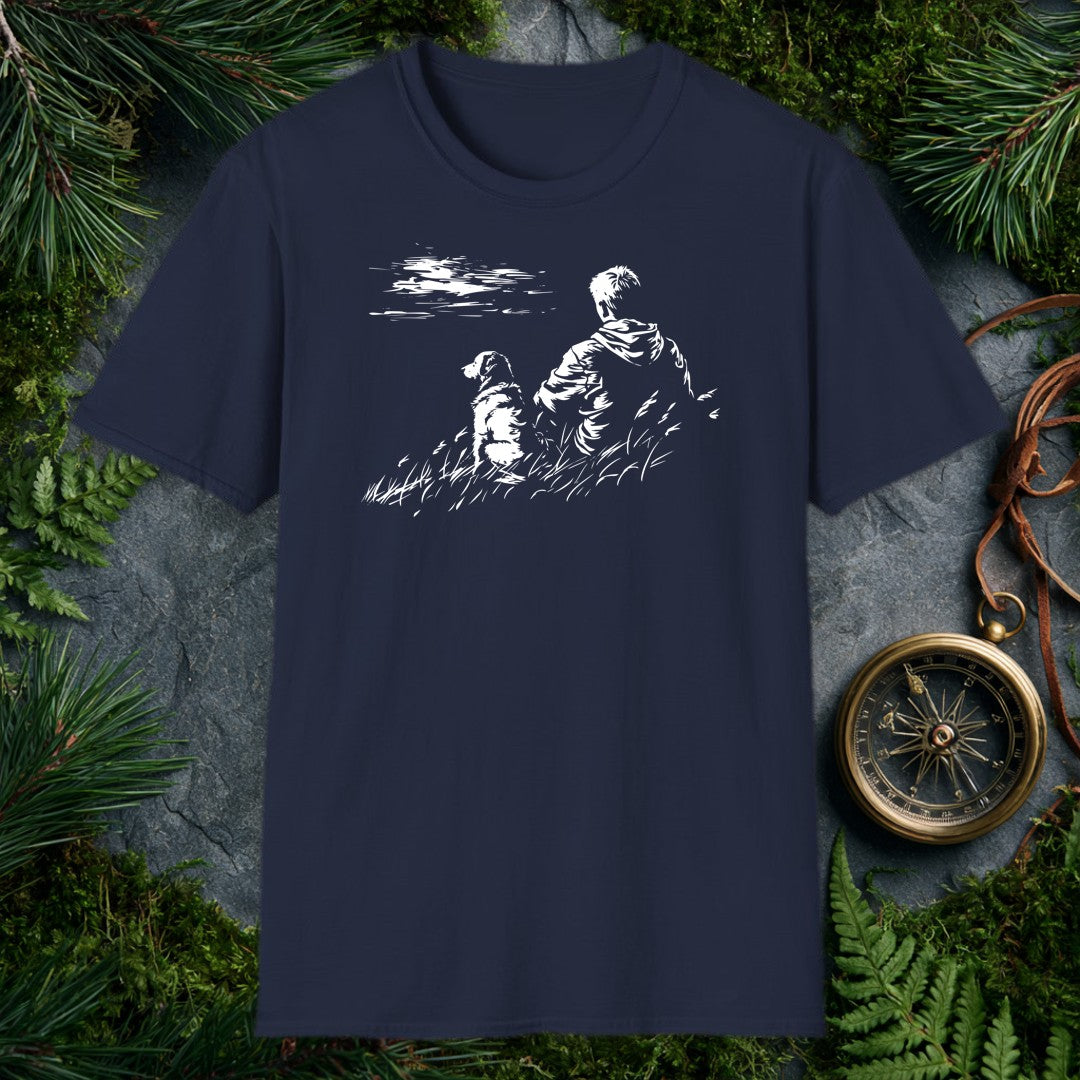 A kid and his dog sit side by side in tall grass, both watching something out across the water — the quiet kind of afternoon you don't forget. For anyone who…