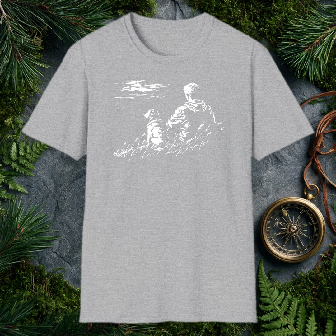 A kid and his dog sit side by side in tall grass, both watching something out across the water — the quiet kind of afternoon you don't forget. For anyone who…