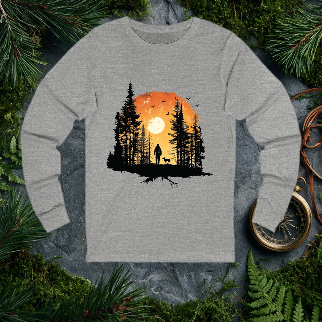 A lone hiker and his dog stand among tall pines as a full sun rises behind them, birds lifting into an amber sky — for the person whose best days start on a…