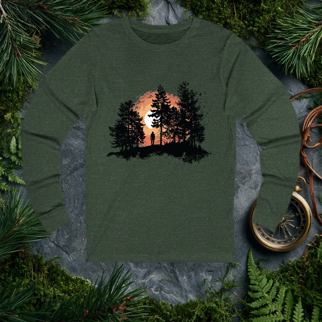 A solitary figure stands among tall pines as a wide sun sets behind them, birds lifting off to the right — for the one who crests a ridge and just stops to…