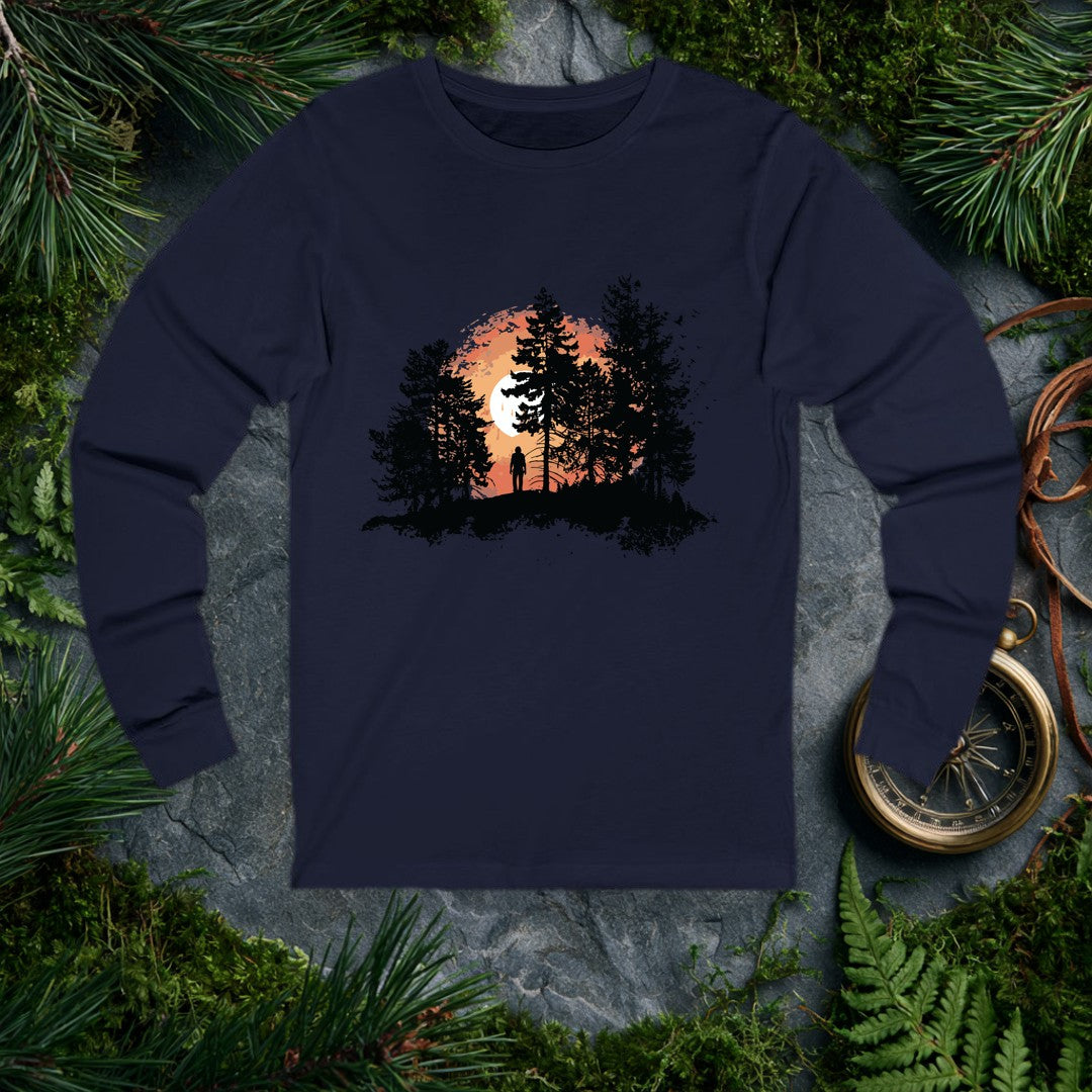 A solitary figure stands among tall pines as a wide sun sets behind them, birds lifting off to the right — for the one who crests a ridge and just stops to…