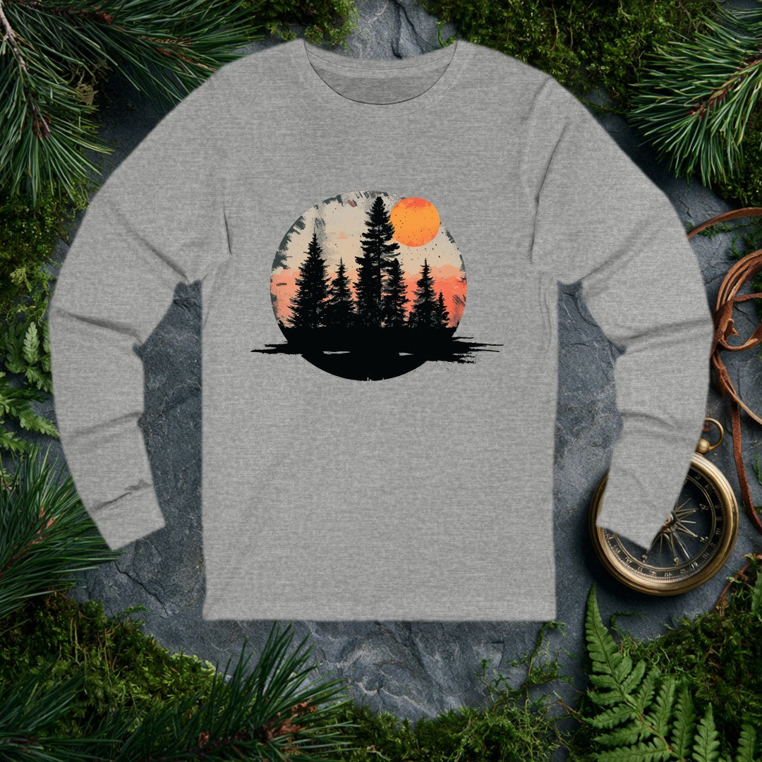 A stand of tall evergreens rises in silhouette against a warm amber sky, a deep orange harvest moon cresting the canopy above layered coral mountains — for the…