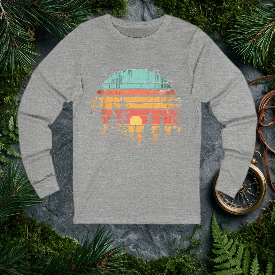Horizontal stripes of teal, rust, and amber band together around a forest silhouette — white pines framing a golden setting sun, the whole scene reflected like…