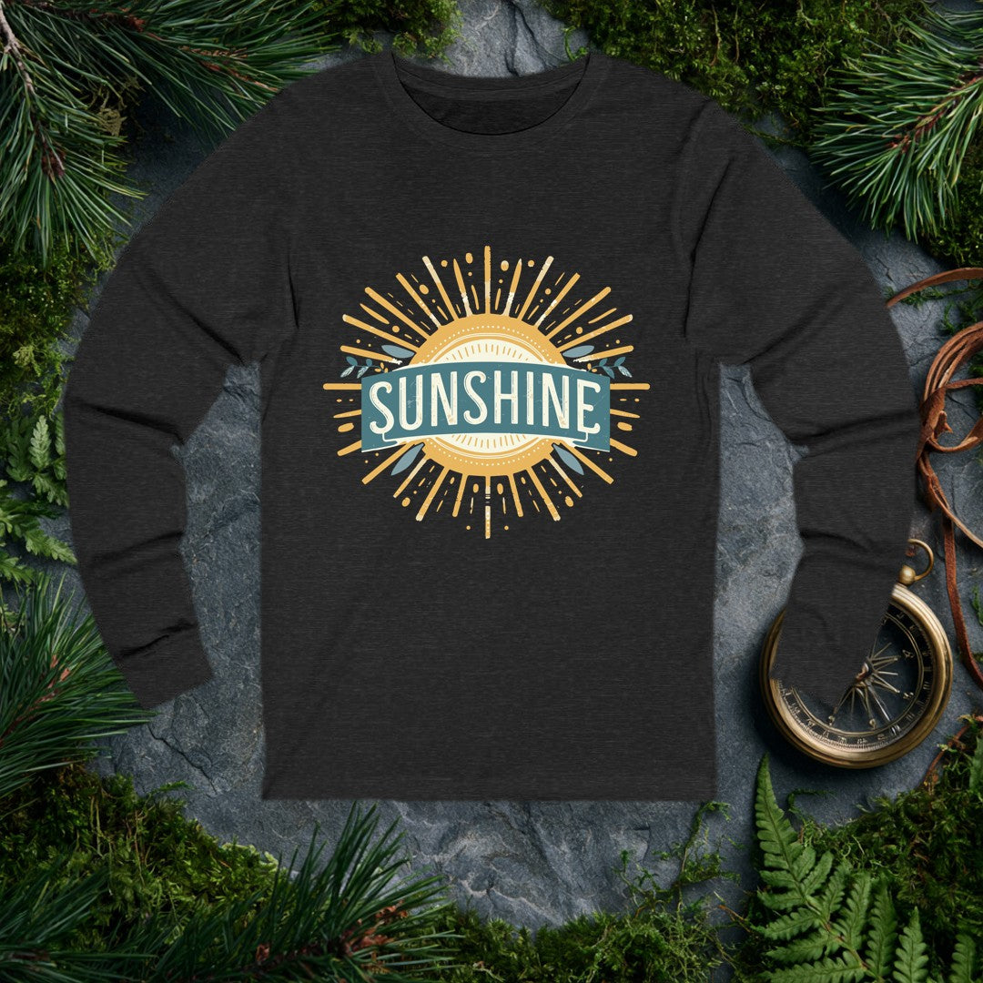 A bold vintage sun bursts outward in warm gold rays, its center framed by a teal banner and sprigs of olive leaves — for the person who chases light on every…