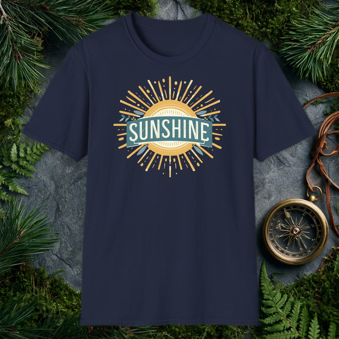 A bold vintage sun bursts outward in warm gold rays, its center framed by a teal banner and sprigs of olive leaves — for the person who chases light on every…