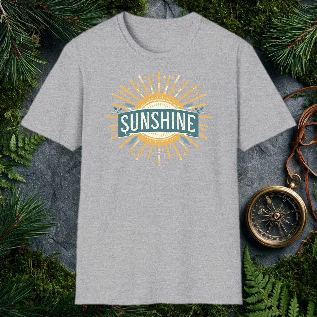 A bold vintage sun bursts outward in warm gold rays, its center framed by a teal banner and sprigs of olive leaves — for the person who chases light on every…