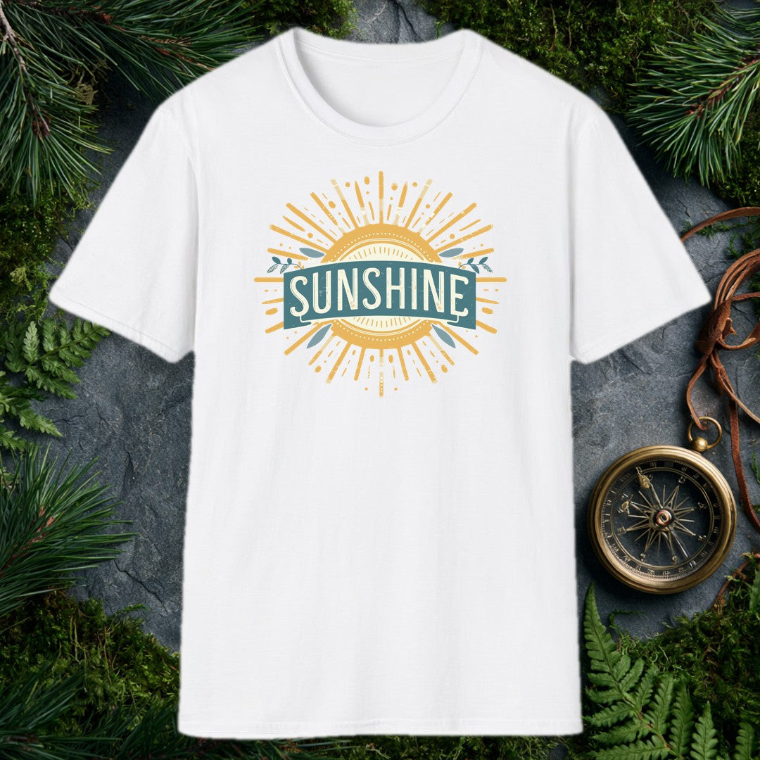 A bold vintage sun bursts outward in warm gold rays, its center framed by a teal banner and sprigs of olive leaves — for the person who chases light on every…