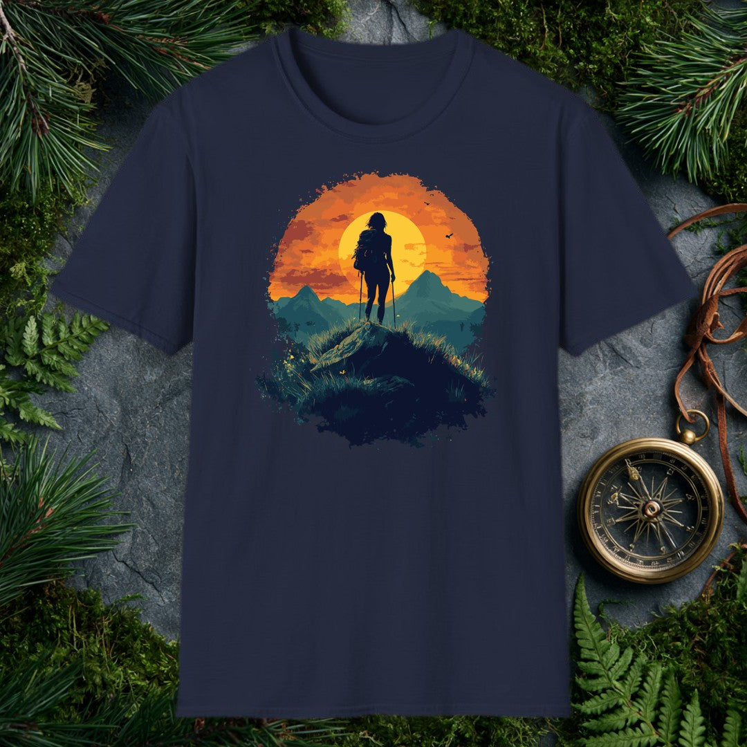 female hiker silhouette with trekking poles and backpack against a large orange sunset circle, teal mountain ridgeline b