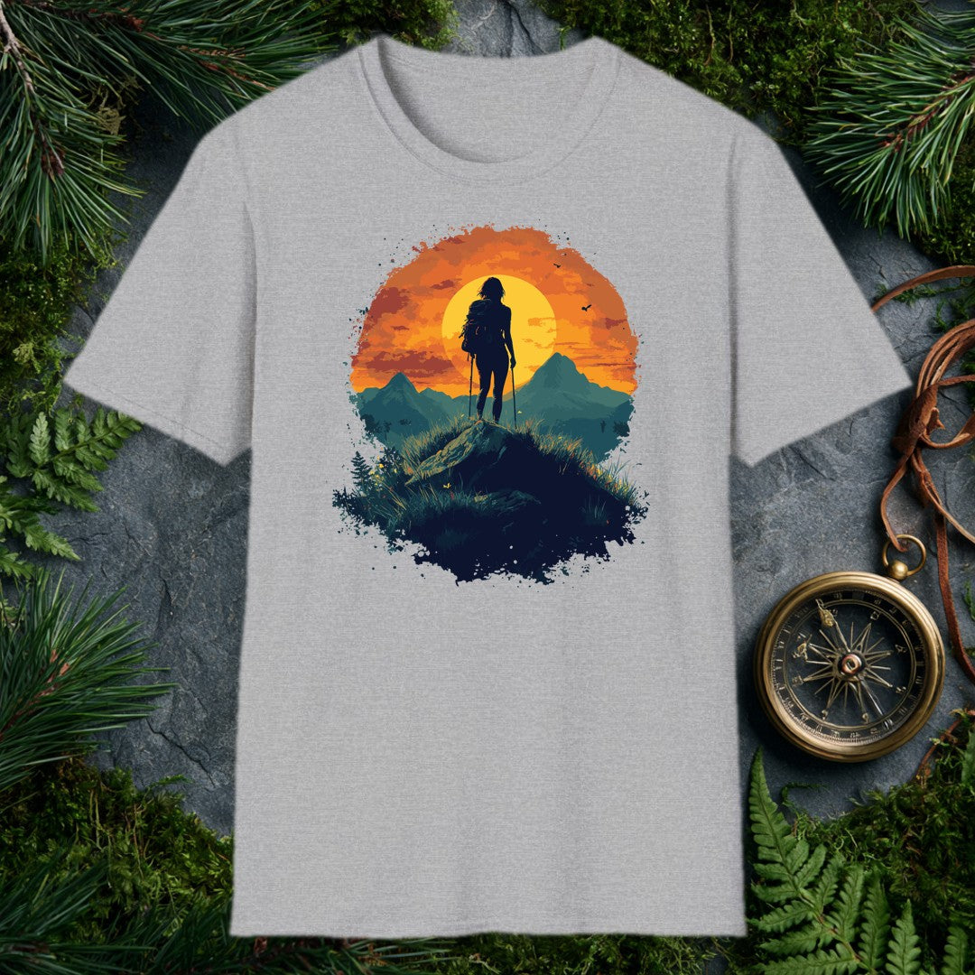 female hiker silhouette with trekking poles and backpack against a large orange sunset circle, teal mountain ridgeline b