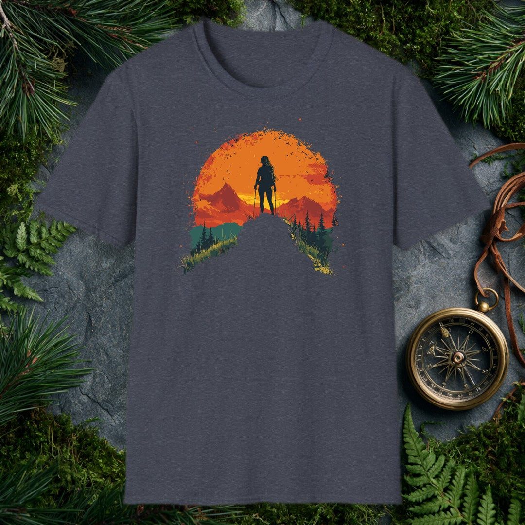 female hiker silhouette with trekking poles against a large orange sun, mountain ridges and pine trees in warm red and t