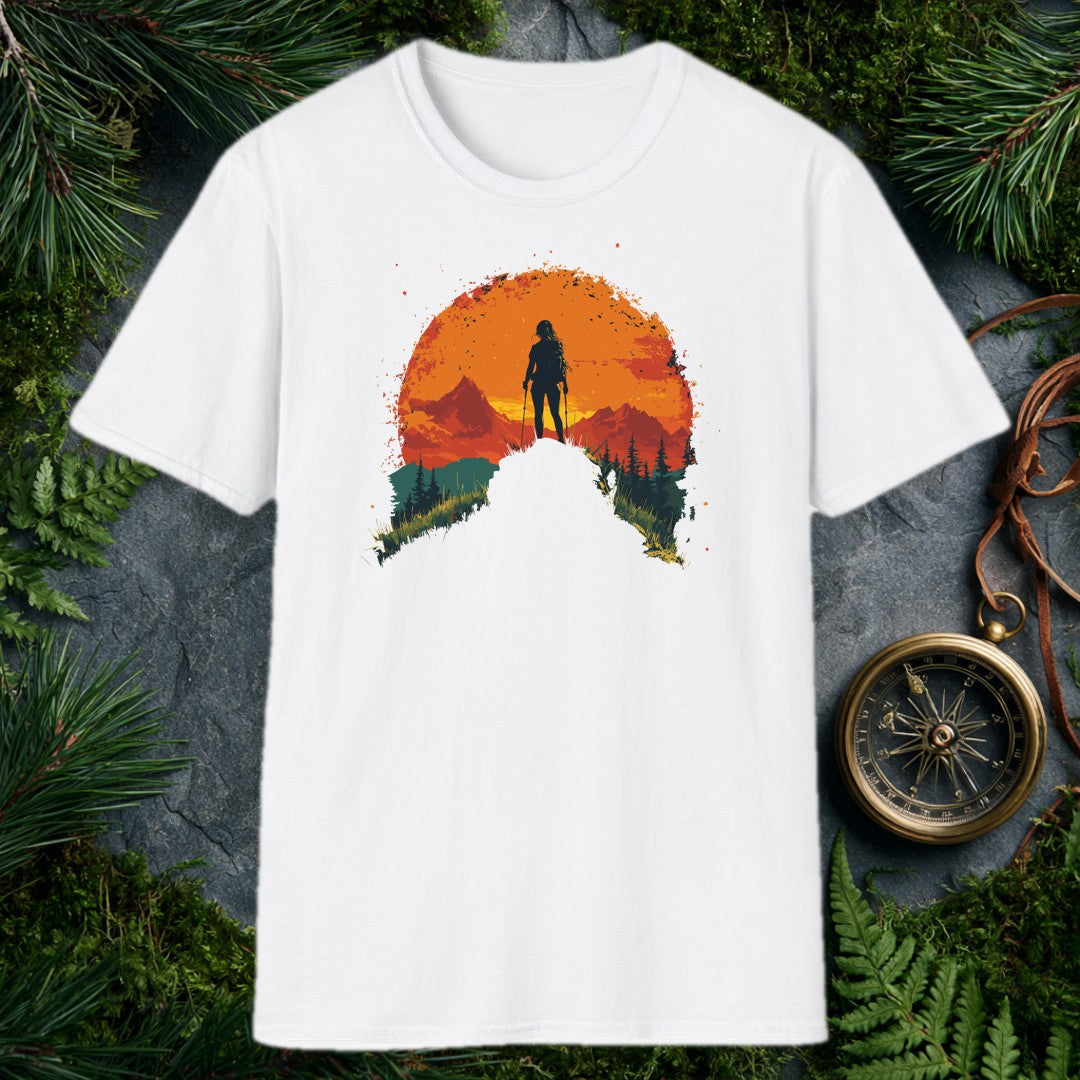 female hiker silhouette with trekking poles against a large orange sun, mountain ridges and pine trees in warm red and t