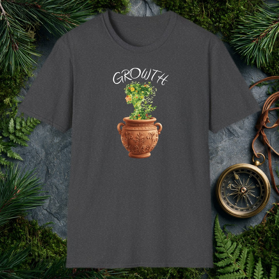 A woman's silhouette grows upward from an ornate terra cotta urn, her form made entirely of green vines, marigolds, and orange-red blooms — made for the…